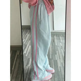Workiaste spodnie w pastelowych kolorach w koreańskim stylu ze wzorem w paski dla modnego wyglądu